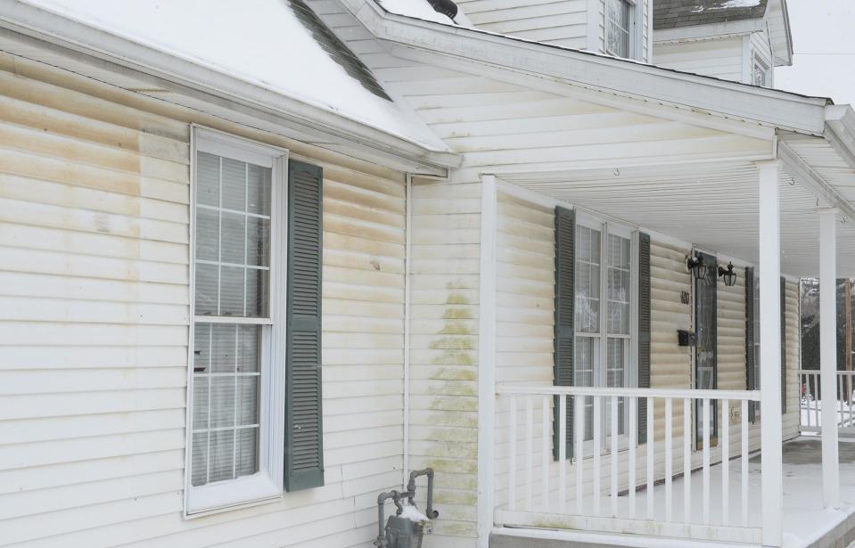 Discolored siding on a house on Hamilton Avenue NE, from which Canton City Public Health took samples in 2017 while investigating complaints about Republic Steel's emissions.