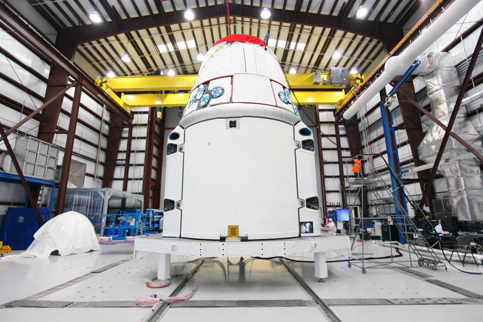 FILE - This Jan. 12, 2013 photo provided by NASA shows the SpaceX Dragon vehicle inside a processing hangar at Cape Canaveral Air Force Station in Cape Canaveral, Fla. SpaceX has scheduled another launch attempt Friday, April 18, 2014 to the International Space Station. NASA confirmed the launch date Wednesday, April 16, 2014, two days after a last-minute rocket leak delayed the delivery mission. Stormy weather, however, is forecast Friday. Saturday is the backup launch date. (AP Photo/NASA, Kim Shiflett)