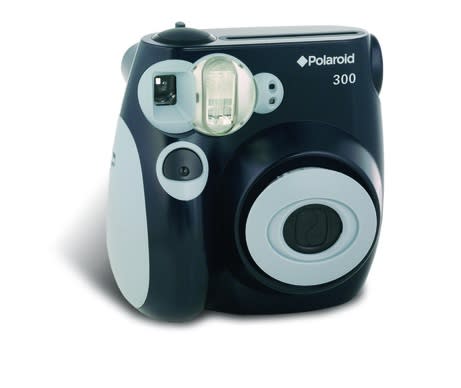 A reissue of the classic Polaroid camera, put to good use in the "Criminal" video. Polariod instant camera, $89.99.