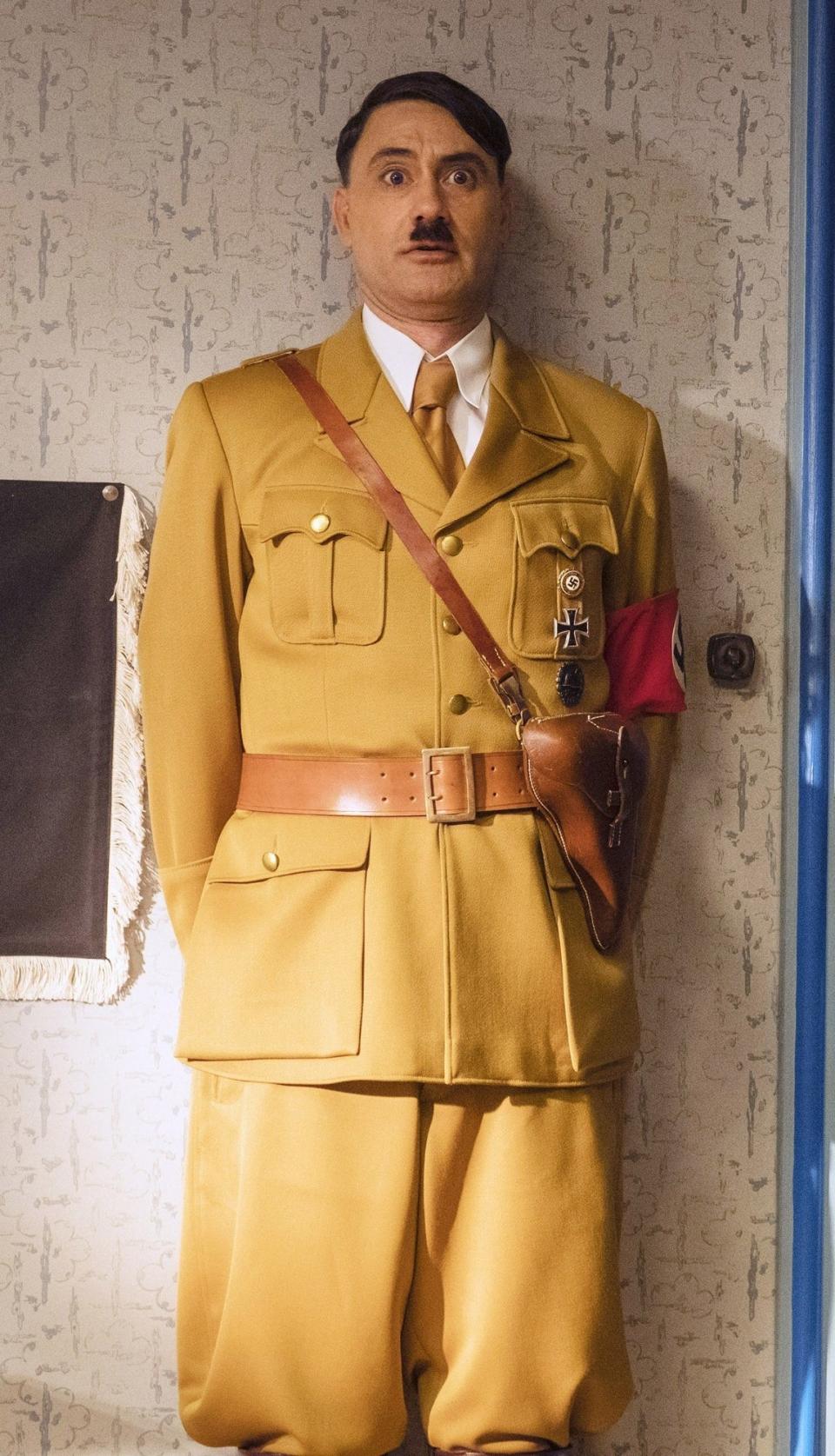 Taika in the film as Hitler