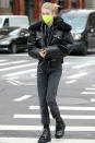 <p><em>Euphoria</em> star Hunter Schafer steps out in all black and a neon green mask on Monday in N.Y.C.</p>