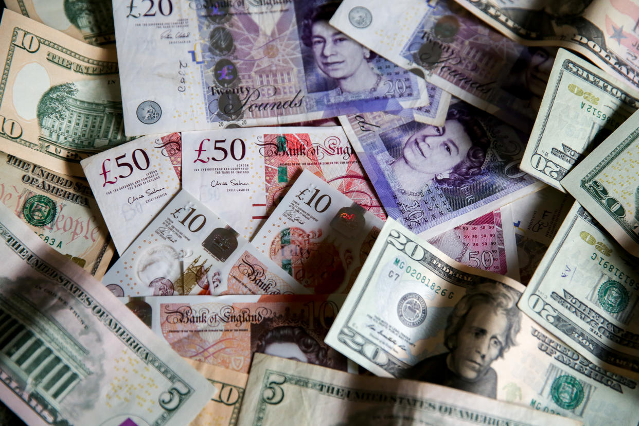 UNITED KINGDOM - 2019/08/07: In this photo illustration, British Pound sterling and US Dollar banknotes are seen as Pound to US Dollar exchange rates are now trading close to a 2 ½ year low, with the Pound now trading under 1.21 on the inter-bank exchange against US dollar.  If the UK leaves the European Union without a deal on 31  2019, it is forecasted that the Pound will fall to the lowest level since 1985 against US Dollar. (Photo Illustration by Steve Taylor/SOPA Images/LightRocket via Getty Images)