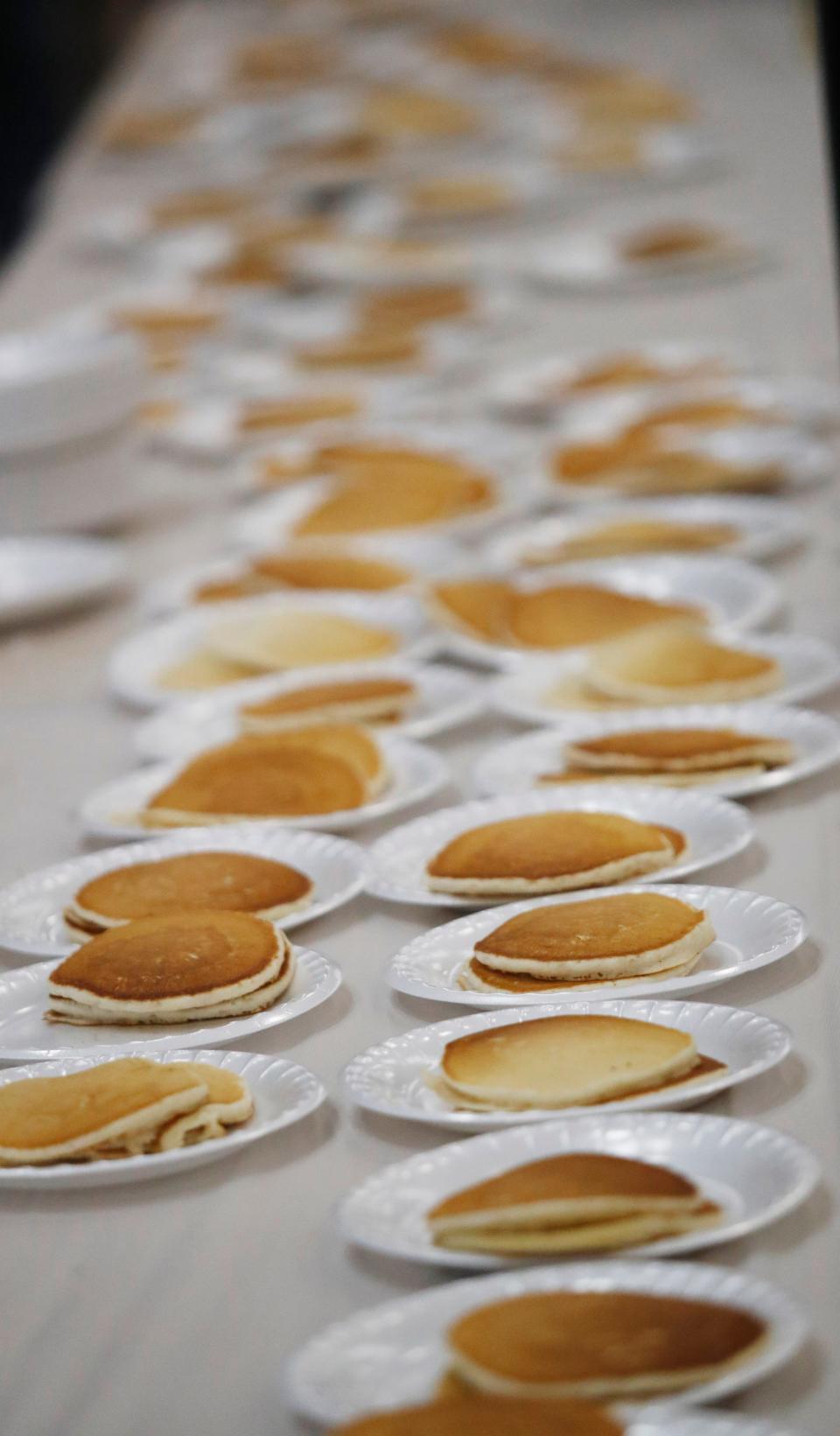 The Lubbock Lions Club held the 71st Annual Pancake Festival at the Lubbock Memorial Civic Center Saturday, Feb. 18, 2023. The event was held from 7am through 8pm. The all-you-can-eat event featured approximately 6,000 lbs. of pancake mix, 41,000 oz. of syrup, 46,500 servings of milk and orange juice, over 2000 bags of cotton candy, 240 gallons of coffee, 80,000 sausage links, 2,000 bags of popcorn and over 23,000 slices of bacon.