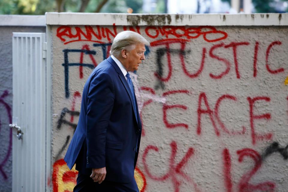 President Donald Trump walks from the White House through Lafayette Park to visit St. John's Church Monday, June 1, 2020, in Washington. (AP Photo/Patrick Semansky) ORG XMIT: DCPS121