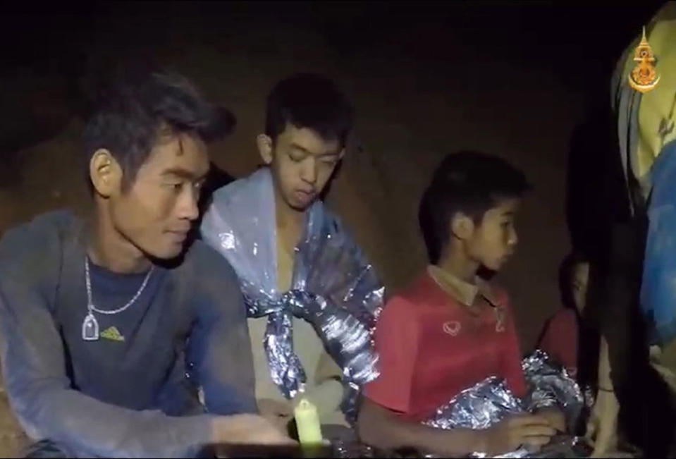 Members of the trapped soccer team in a section of Tham Luang cave. Source: AAP