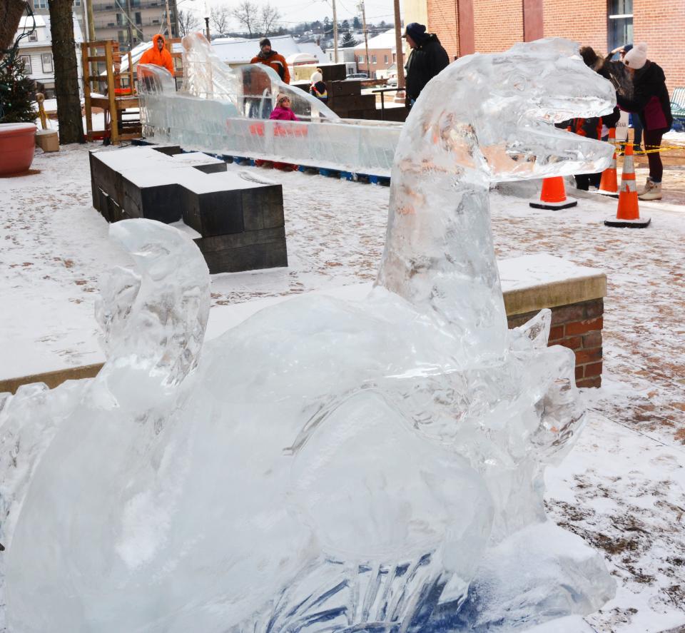 Don't know if this dinosaur ice sculpture was watching the ice slide or wanted to join in the fun last year during the 28th annual Fire & Ice Festival in Somerset. Jurassic Somerset was the theme of the festival.
(Credit: Staff photo by Madolin Edwards)