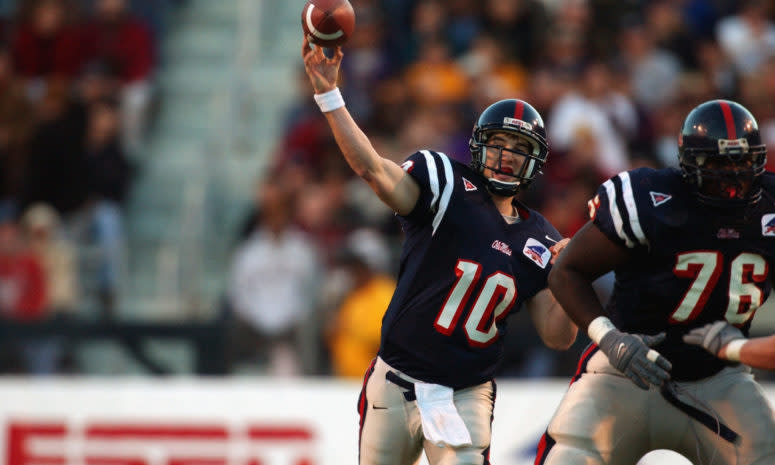 Eli Manning throws a pass back when he played at Ole Miss.