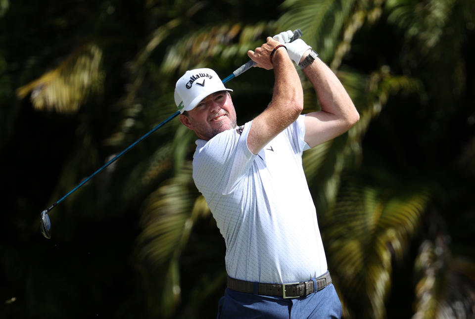 Seen here, Robert Garrigus plays his shot from the fourth tee during the first round of the Puerto Rico Open in 2021.