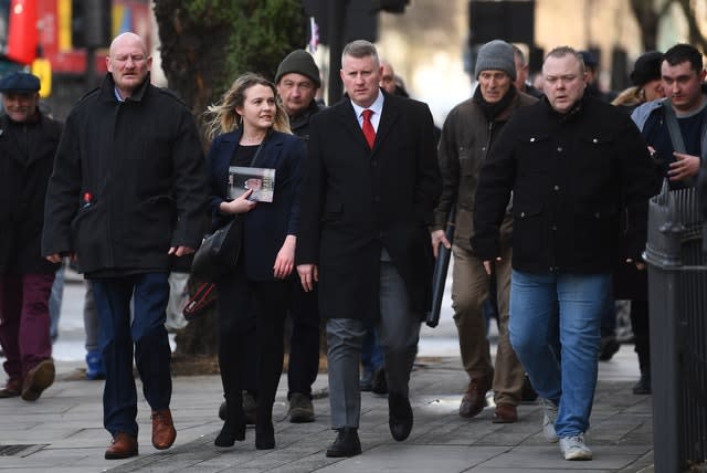 Britain First leader Paul Golding (centre) is flanked by supporters (Victoria Jones/PA)