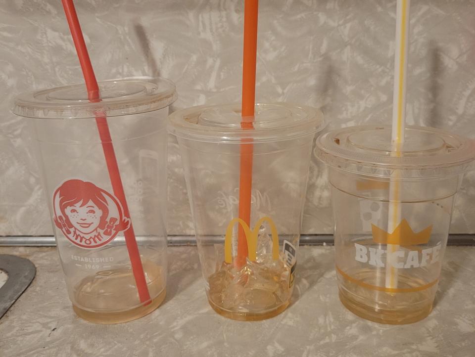 empty iced coffee cups from wendy's mcdonalds and burger king