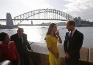 Britain's Prince William and his wife Catherine, the Duchess of Cambridge, are pictured in front of the Sydney Harbour Bridge during a reception at the Sydney Opera House, April 16, 2014. Pictured at left are Governor of New South Wales Marie Bashir and her husband Nicholas Shehadie. Britain's Prince William and his wife Kate are undertaking a 19-day official visit to New Zealand and Australia with their son George. REUTERS/Jason Reed (AUSTRALIA - Tags: ROYALS ENTERTAINMENT POLITICS TPX IMAGES OF THE DAY)