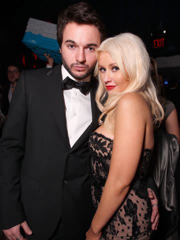 <p>Alexandra Wyman/Getty</p> Matt Rutler and Christina Aguilera at the InStyle and Warner Bros. 68th Golden Globe Awards post-party in January 2011.