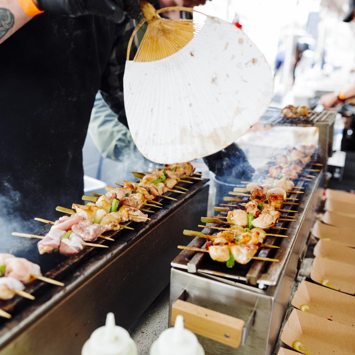 Circle Pit BBQ prepares yakitori, or Japanese style grilled chicken, at Feast Wilmington.