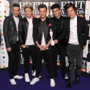 The boys go for an edgier look as the pick up their Brit awards, in black, leather and crisp white shirts. Very Grease.