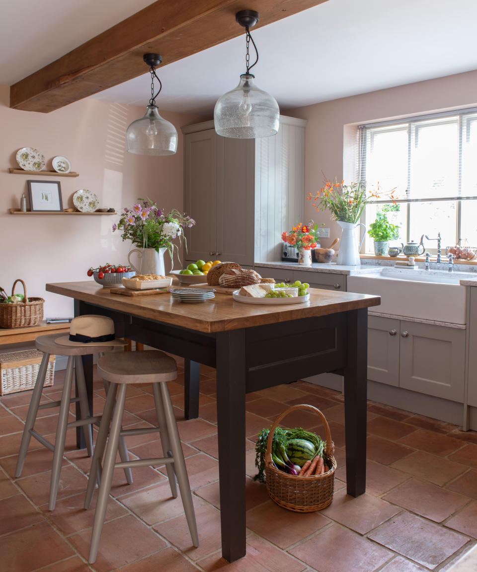 farmhouse kitchen island in a country kitchen with flagstone floor