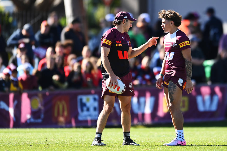 TOOWOOMBA, AUSTRALIA - JUNE 18: Reece Walsh and Billy Slater are seen during a Queensland Maroons State of Origin training session & fan day at Toowoomba Sports Ground on June 18, 2024 in Toowoomba, Australia. (Photo by Albert Perez/Getty Images)