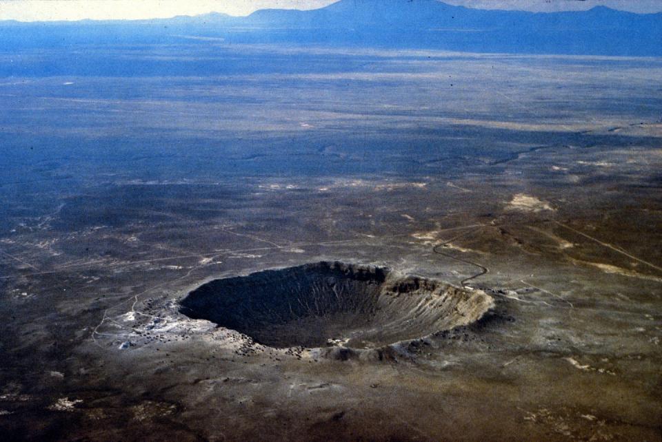 This crater near Flagstaff, Arizona, was created when an asteroid estimated to be 160 feet (50 meters) across crashed into Earth around 50,000 years ago. <a href="https://commons.wikimedia.org/wiki/File:Barringer_Crater_aerial_photo_by_USGS.jpg#/media/File:Barringer_Crater_aerial_photo_by_USGS.jpg" rel="nofollow noopener" target="_blank" data-ylk="slk:USGS/D. Roddy via Wikimedia Commons;elm:context_link;itc:0;sec:content-canvas" class="link ">USGS/D. Roddy via Wikimedia Commons</a>