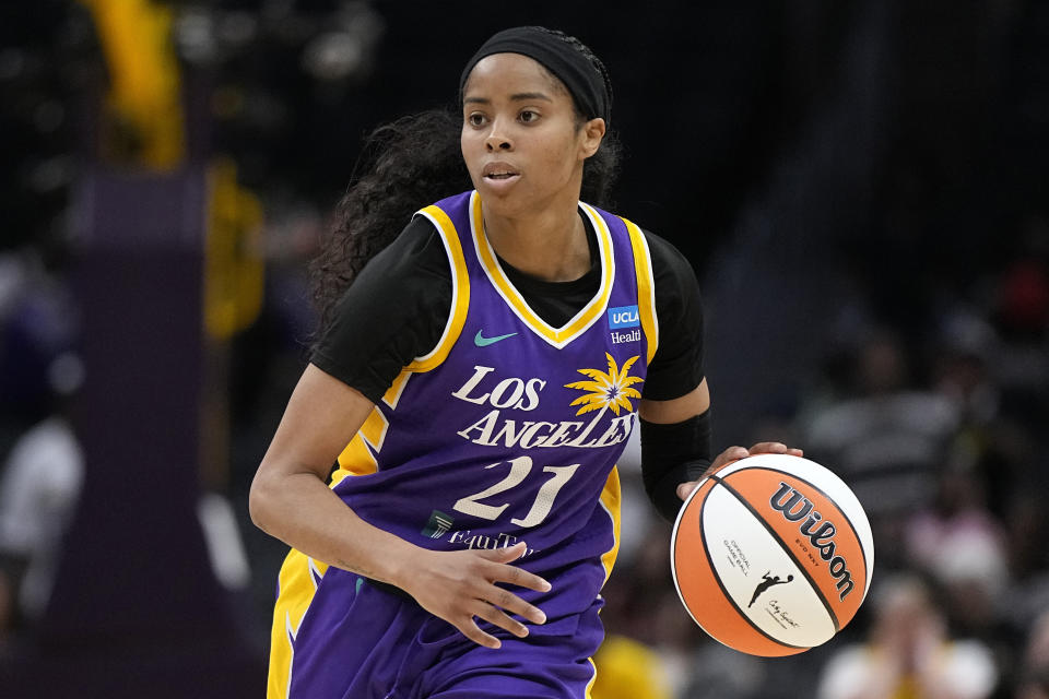 FILE - Los Angeles Sparks guard Jordin Canada dribbles during the second half of a WNBA basketball game against the Minnesota Lynx Tuesday, June 20, 2023, in Los Angeles. The Atlanta Dream acquired two-time WNBA steals leader Jordin Canada in a trade that sent guard Aari McDonald to the Los Angeles Sparks on Thursday, Feb. 1, 2024.(AP Photo/Mark J. Terrill, File)