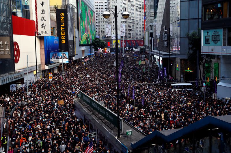 Protesters march for human rights in Hong Kong