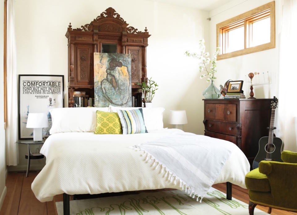 <body> <p>Creamy whites with a touch of gold add a <a rel="nofollow noopener" href=" http://www.bobvila.com/slideshow/11-things-never-to-keep-in-your-bedroom-48375?bv=yahoo" target="_blank" data-ylk="slk:sense of comfort;elm:context_link;itc:0;sec:content-canvas" class="link ">sense of comfort</a> to this luxe bedroom. Style is layered on with antiques in toasty wood tones and pops of bright lime green.</p> <p><strong>Related: <a rel="nofollow noopener" href=" http://www.bobvila.com/slideshow/the-only-colors-you-should-use-in-a-small-space-49135?#.Vz4CW5PyuRs?bv=yahoo" target="_blank" data-ylk="slk:The Only Colors You Should Use in a Small Space;elm:context_link;itc:0;sec:content-canvas" class="link ">The Only Colors You Should Use in a Small Space</a> </strong> </p> </body>