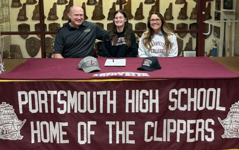 Portsmouth High School senior Lily Jenkins recently signed her letter of commitment to run track and field for Lafayette College. Jenkins is joined by her parents, John-Michael and Heather Jenkins.