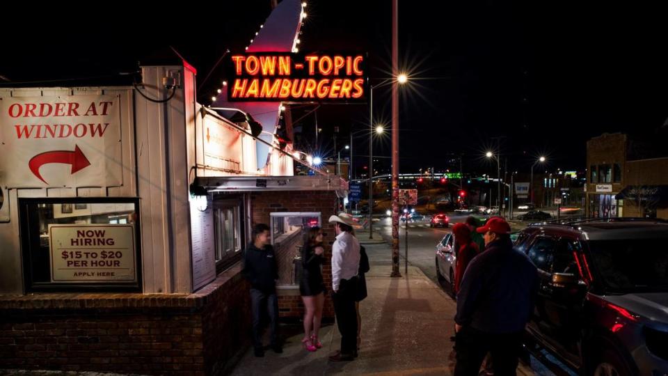 On a chilly February night, customers line up outside of Town Topic Hamburgers, on Broadway just north of Southwest Trafficway.