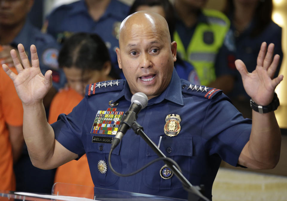 FILE - In this Oct. 24, 2017, file photo, then Philippine National Police Chief Director General Ronald Dela Rosa gestures as he talks to reporters at police headquarters in metropolitan Manila, Philippines. Elections officials were to proclaim the winners Wednesday, May 22, 2019, after finishing the official count of the May 13 elections overnight. President Rodrigo Duterte backed eight winning aspirants to half of the seats in the 24-member Senate, including his former national police chief, Ronald dela Rosa, who enforced the president's crackdown on illegal drugs in a campaign that left thousands of suspects dead and drew international condemnation. (AP Photo/Aaron Favila, File)