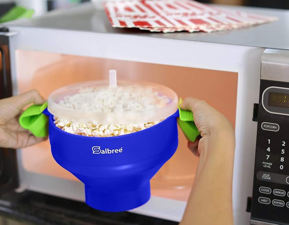 For movie enthusiasts who love popcorn but would also love an alternative to the microwave bags they've been using since childhood. This is dishwasher-safe and BPA-free.<br /><br /><strong>Promising review:</strong> "We love popcorn in this house, and generally pop a giant bowlful at a time from an air popper for a movie night (seven family members). <strong>This silicone popper makes it MUCH more practical to pop just a serving or two without buying the nasty yellow waxy bagged microwave popcorn.</strong> The quality of popcorn is just as great as we've always been accustomed to, and the amount of unpopped (waste) corn is similar to bagged microwave popcorn &ndash; in other words, minimal." &mdash; <a href="https://www.amazon.com/gp/profile/amzn1.account.AF26UY3BAJU2AAVTCN7WZ7KZZAZA?tag=bfmal-20&amp;ascsubtag=5878601%2C6%2C32%2Cd%2C0%2C0%2Cgoogle%2C962%3A1%3B901%3A2%3B900%3A2%3B974%3A3%3B975%3A2%3B982%3A4%2C16416161%2C0" target="_blank" rel="nofollow noopener noreferrer" data-skimlinks-tracking="5878601" data-vars-affiliate="Amazon" data-vars-href="https://www.amazon.com/gp/profile/amzn1.account.AF26UY3BAJU2AAVTCN7WZ7KZZAZA?tag=bfmal-20&amp;ascsubtag=5878601%2C6%2C32%2Cmobile_web%2C0%2C0%2C16416161" data-vars-keywords="cleaning" data-vars-link-id="16416161" data-vars-price="" data-vars-product-id="15961809" data-vars-retailers="Amazon">HRA</a><br /><br /><strong>Get it from Amazon for <a href="https://amzn.to/3x22DpO" target="_blank" rel="noopener noreferrer">$15.90</a> (available in 23 colors).</strong>