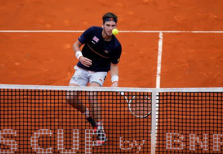 FILE PHOTO: Tennis - Davis Cup - First Round - Spain vs Great Britain - Club de Tenis Puente Romano, Marbella, Spain - February 4, 2018 Great Britain's Cameron Norrie in action during his match against Spain's Albert Ramos-Vinolas REUTERS/Jon Nazca