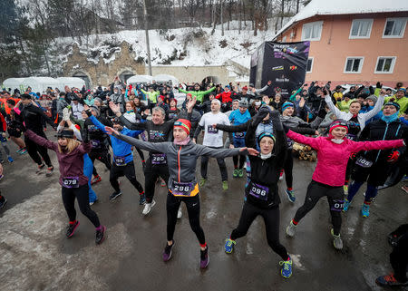 Participants prepare for the "Milestii Mici Wine Run 2019" race, at a distance of 10 km in the world's largest wine cellars in Milestii Mici, Moldova January 20, 2019. Picture taken January 20, 2019. REUTERS/Gleb Garanich