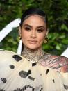<p>In a recent interview with Byrdie, Kehlani shared that they had <a href="https://www.byrdie.com/kehlani-interview-5203051" class="link rapid-noclick-resp" rel="nofollow noopener" target="_blank" data-ylk="slk:recently removed their breast implants">recently removed their breast implants</a> after years of health complications. "I got breast implants about four years ago because I was very much struggling with what beauty meant to me," they told the publication. "I remember this video of me performing went viral. People were like 'she's horribly built.' So I went and got breast implants."</p> <p>The decision to remove them stemmed from years of sickness like fatigue and joint pain, to name a few, which can sometimes happen to patients who have undergone breast augmentation surgery with silicone implants. Now that the implants are out, Kehlani said, "I actually feel way more beautiful than I ever felt because I feel healthy."</p>