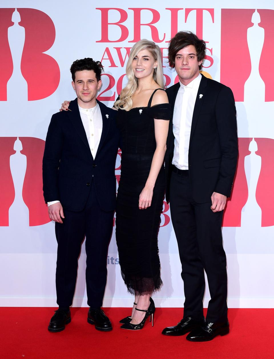 <p>London Grammar's Hannah Reid, Dan Rothman and Dominic 'Dot' Major attending the Brit Awards at the O2 Arena</p> (PA)