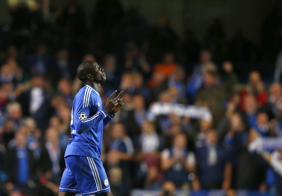 Chelsea's Demba Ba celebrates after scoring a goal against FC Schalke 04 during their Champions League soccer match at Stamford Bridge in London November 6, 2013. REUTERS/Eddie Keogh (BRITAIN - Tags: SPORT SOCCER)