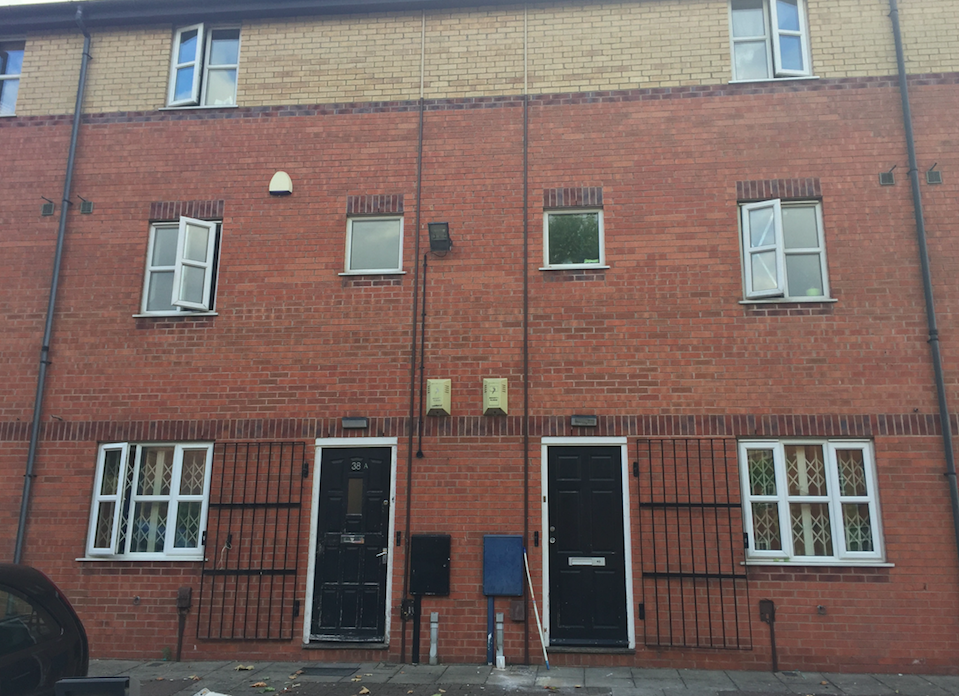 <em>A residential property (left) on Peveril Street in Nottingham which was searched by police (PA)</em>