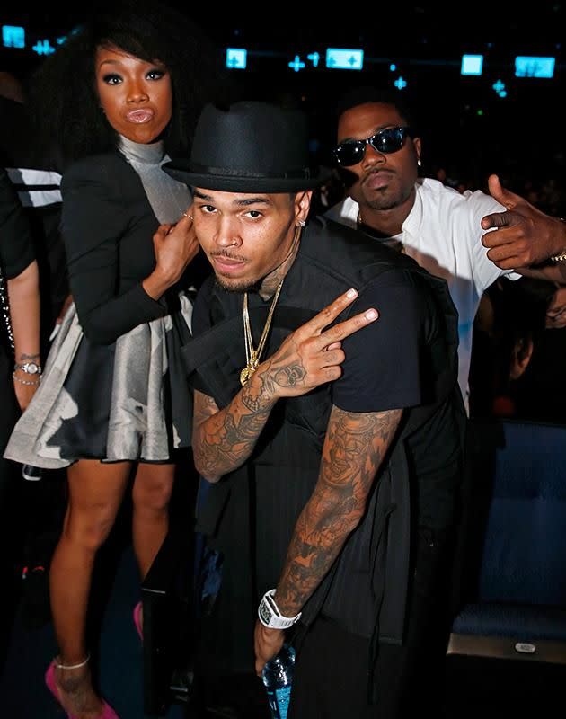 Chris Brown and Ray J with his sister Brandy Norwood. Source: Getty