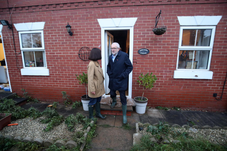 Labour leader Jeremy Corbyn and Labour MP Caroline Flint during a visit to Conisborough, South Yorkshire, where he met residents affected by flooding.