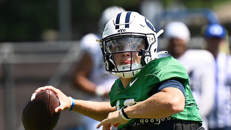 BYU quarterback Ryder Burton looks for a receiver during practice in Provo on Tuesday, Aug. 8, 2023. Burton recently entered the transfer portal.