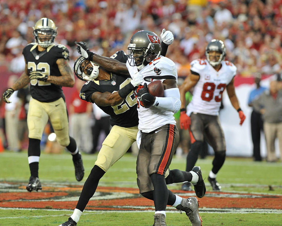 Wide receiver Mike Williams #19 of the Tampa Bay Buccaneers rushes upfield with a pass against the New Orleans Saints September 15, 2013 at Raymond James Stadium in Tampa, Florida. The Saints won 16 – 14. (Photo by Al Messerschmidt/Getty Images)