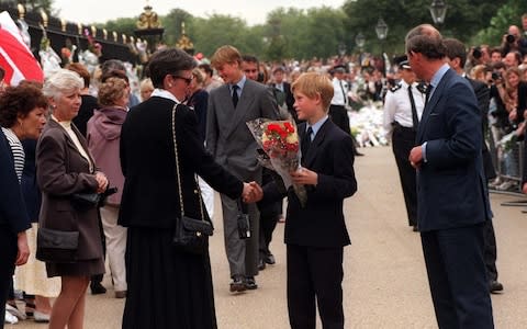 Prince Harry accepts flowers five days after his mother's death