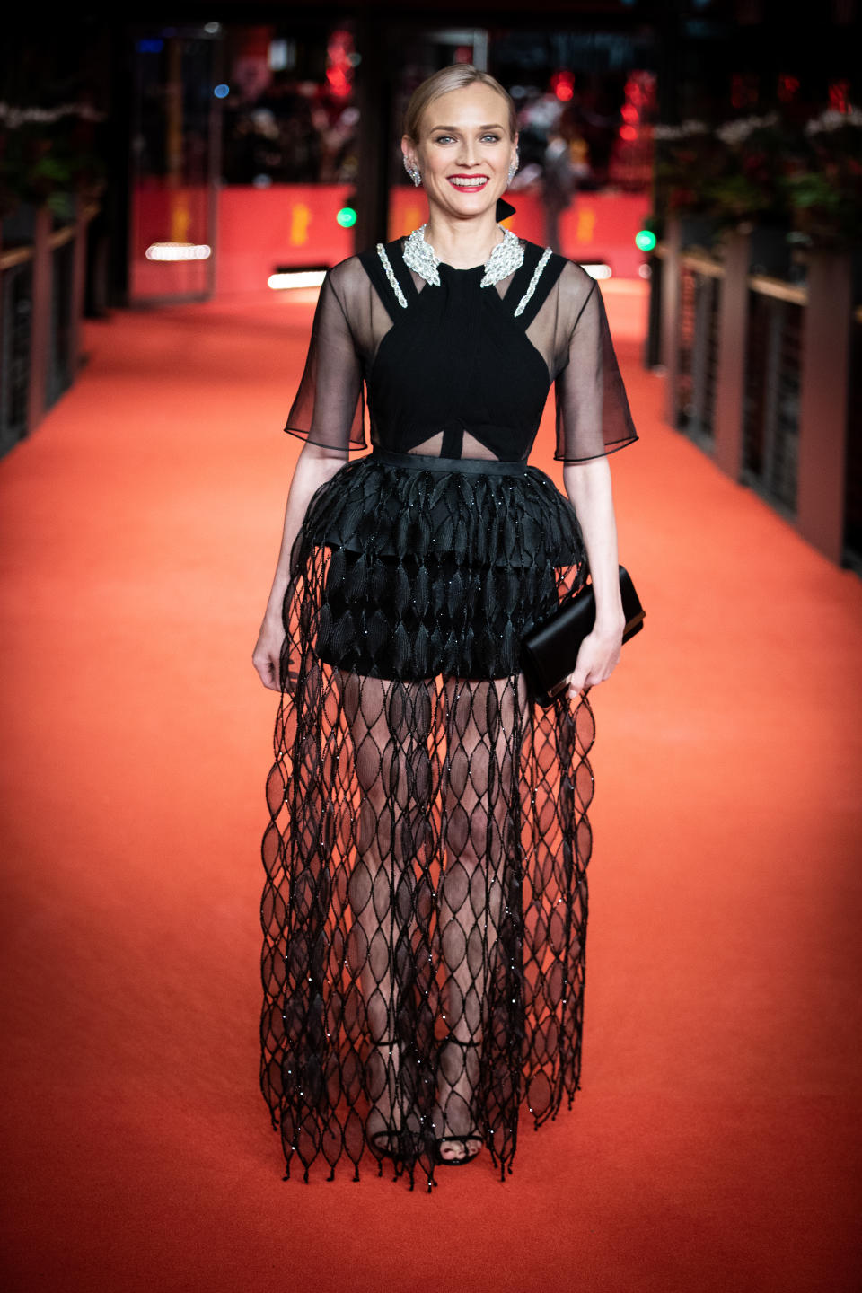 <p>Diane Kruger wore a black mesh dress by Givenchy on the red carpet for the premiere of ‘The Operative’, which took place during the 69th Berlinale Film Festival in Berlin. <em>[Photo: Getty]</em> </p>