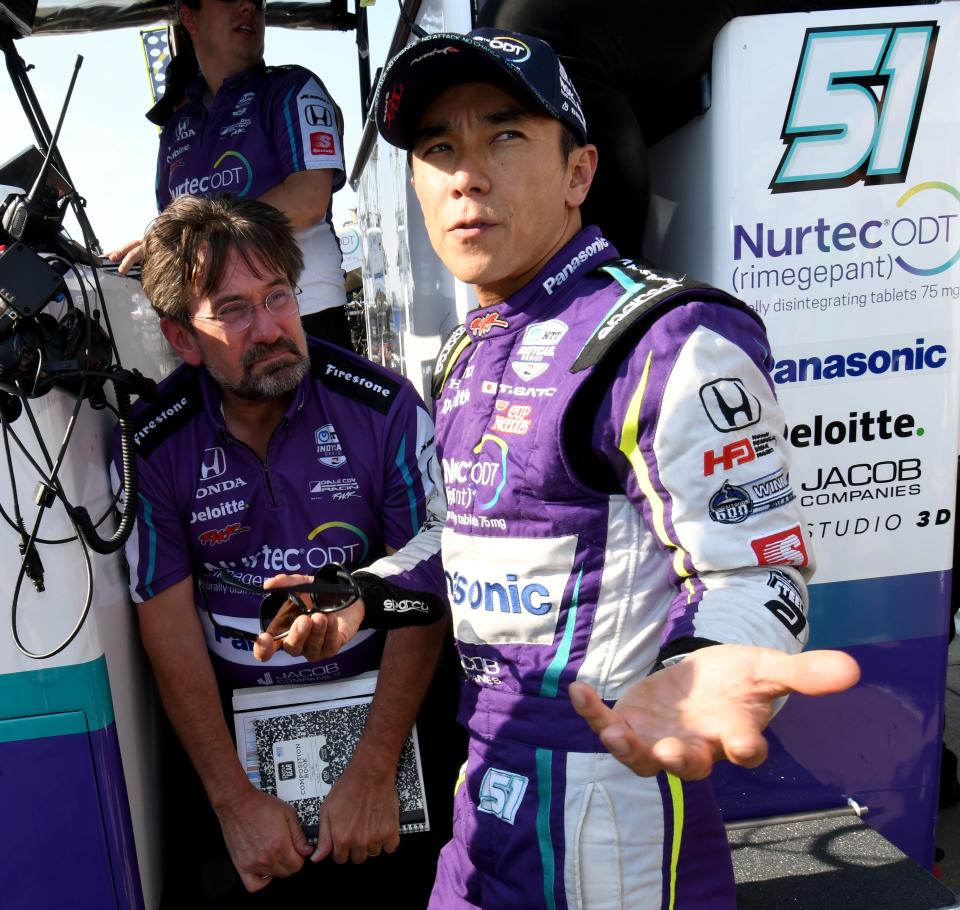 Dale Coyne Racing with Rick Ware Racing driver Takuma Sato (51) talks with his crew Friday, May 20, 2022, during Fast Friday practice in preparation for the 106th running of the Indianapolis 500 at Indianapolis Motor Speedway