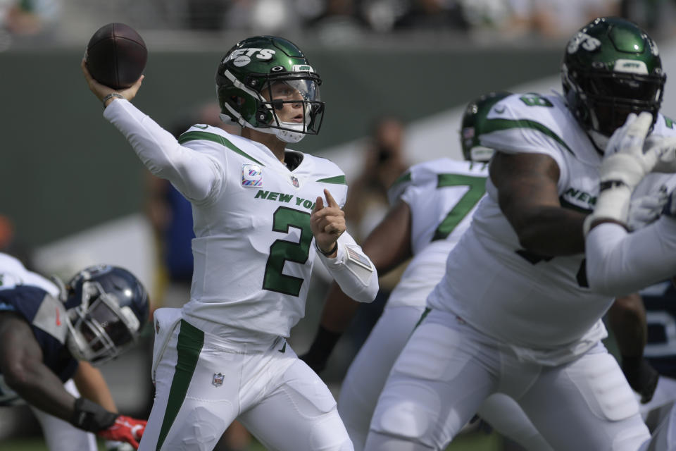 New York Jets quarterback Zach Wilson passes during the first half of an NFL football game against the Tennessee Titans, Sunday, Oct. 3, 2021, in East Rutherford. (AP Photo/Bill Kostroun)