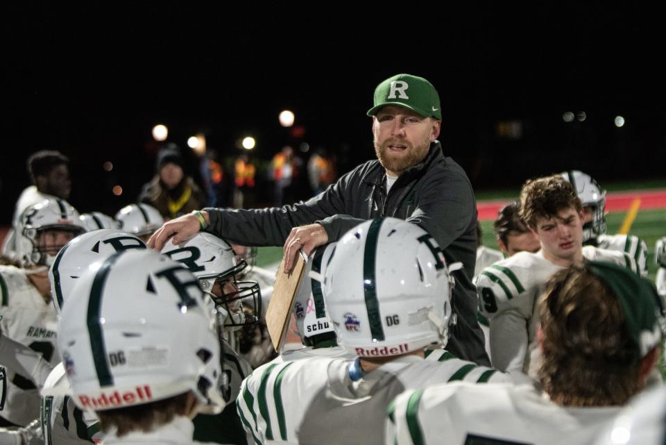 Northern Highlands hosts Ramapo in the North 1, Group 4 football title game in Allendale on Friday, Nov. 26, 2021. This is first game for Ramapo since the death of coach Drew Gibbs. Brian Gibbs, Drew Gibbs' son, consoles the team after their loss to Northern Highlands.