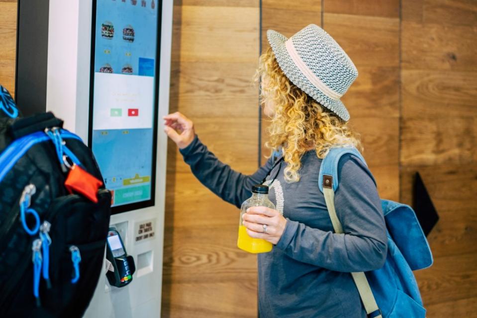 While kiosks might provide ease for the customer, they also tend to get customers to spend more than they would otherwise. Getty Images/iStockphoto