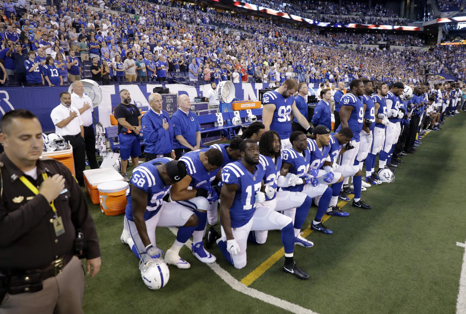 Members of the Indianapolis Colts take a knee during the National Anthem before the team played the Cleveland Browns on Sept. 24. (AP)