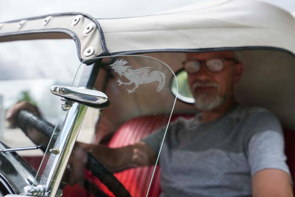 Carrying on the bantam theme, a rooster image is etched on the wind wing of Robert Cunningham's 1932 American Austin Bantam roadster. It's an original and likely irreplaceable feature of the exceedingly rare car.