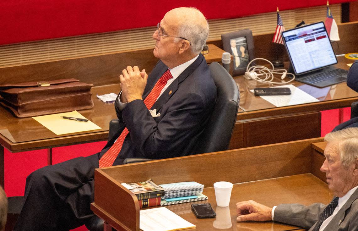 Rep. Ted Davis, a Republican from Wilmington, listens to debate on the House floor prior to voting to override Gov. Roy Cooper’s veto of an abortion restriction bill Tuesday, May 16, 2023, at the Legislative Building in Raleigh, N.C. Travis Long/tlong@newsobserver.com