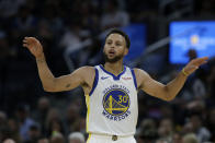 FILE - In this Oct. 5, 2019, file photo, Golden State Warriors guard Stephen Curry gestures against the Los Angeles Lakers during a preseason NBA basketball game in San Francisco. Curry knows how different this season will be. He realizes how many aren't even considering the Golden State Warriors a for-sure contender following five straight trips to the NBA Finals. No Kevin Durant. No Andre Iguodala. No Shaun Livingston. And that's just to name a few of the departed players who made such key contributions to the franchise's recent runs of success. (AP Photo/Jeff Chiu, File )