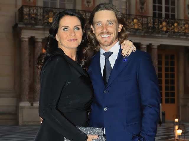 <p>Andrew Redington/Getty</p> Tommy Fleetwood and his wife Clare Fleetwood in September 2018 in in Versailles, France.