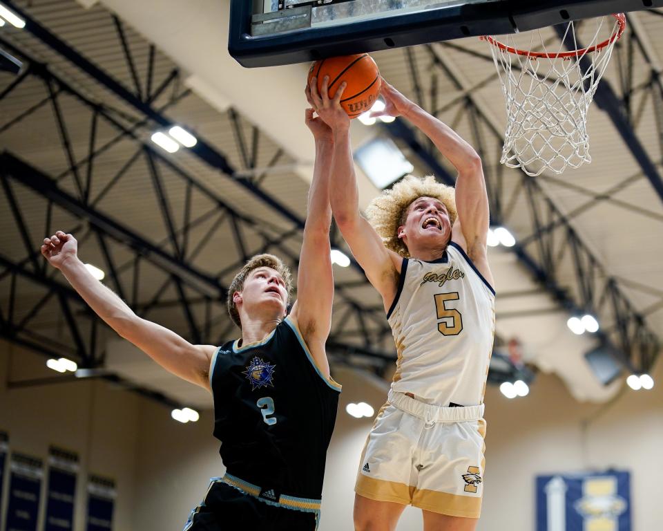 Brentwood's Daniel Cochran (2) defends against Inependence's Tylan Lewis (5) during the fourth quarter at Independence High School in Thompson's Station, Tenn., Wednesday, Jan. 24, 2024.